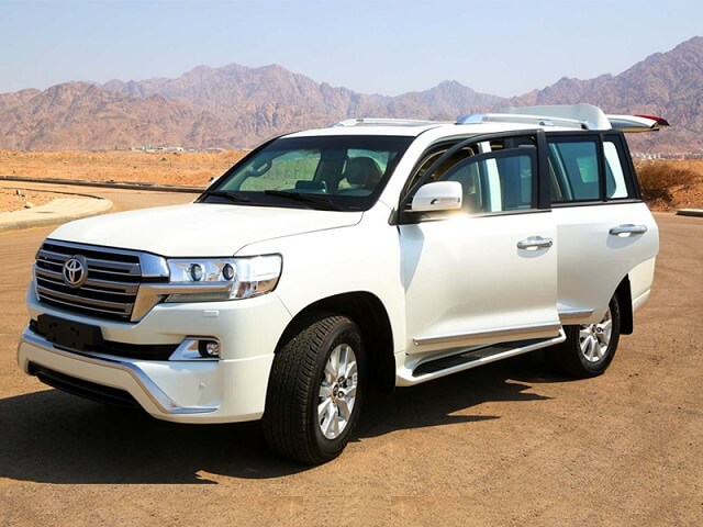 white Armored Land Cruiser front and side doors open